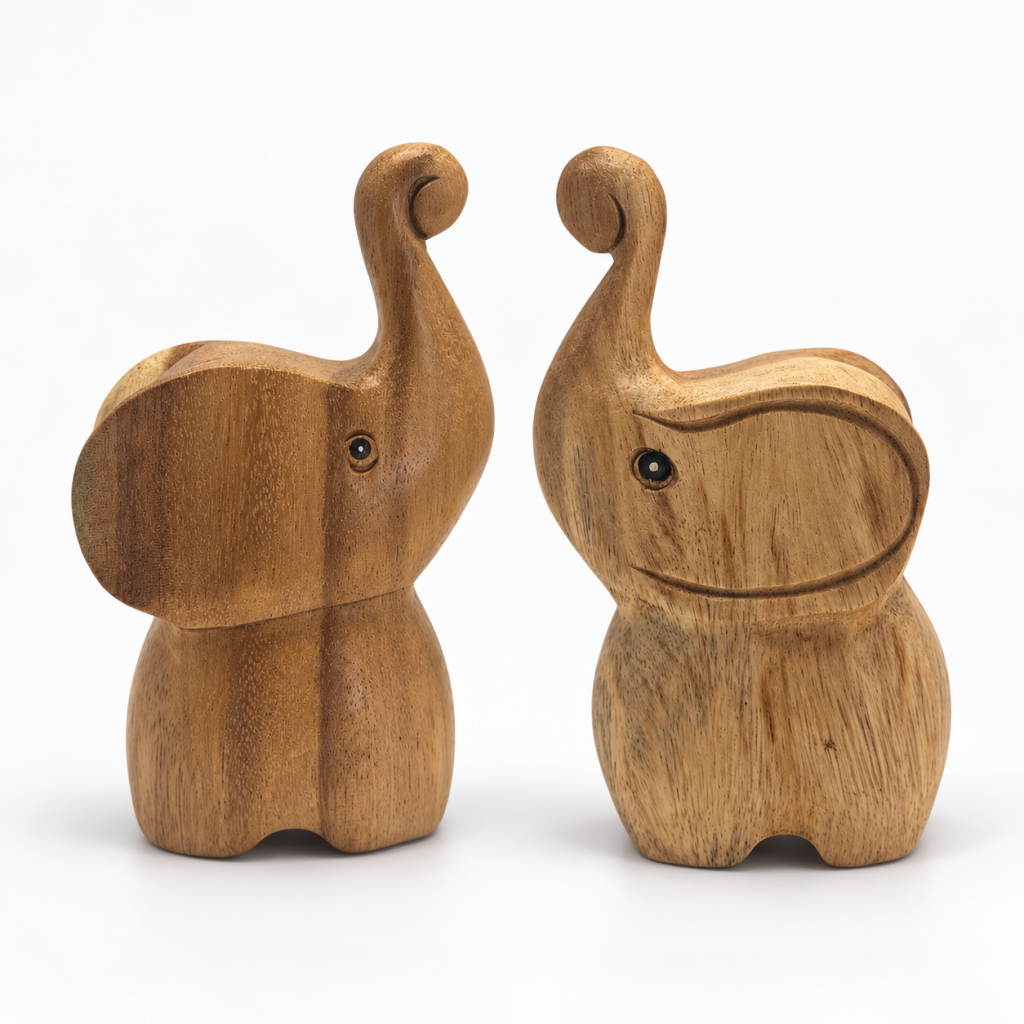 Two round-bellied wooden elephants