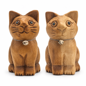 Two sitting wooden cats